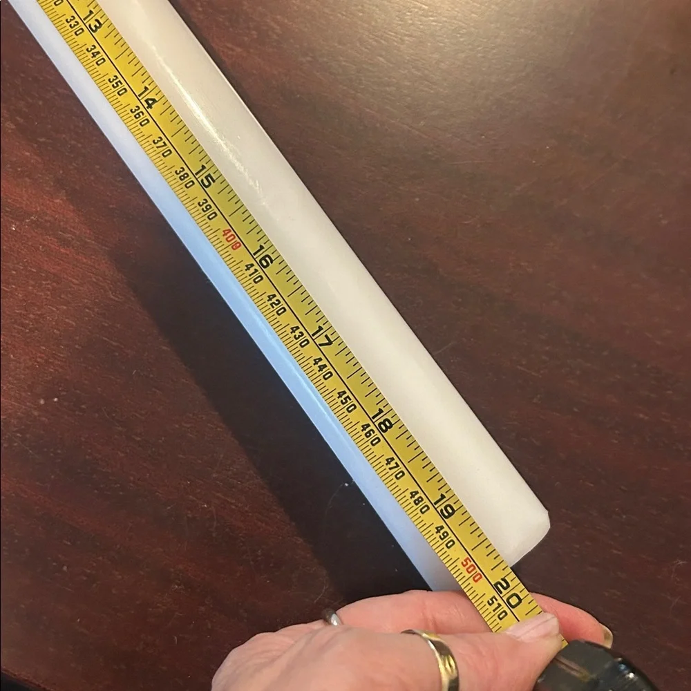 Plastic rolling pin approximately 20”